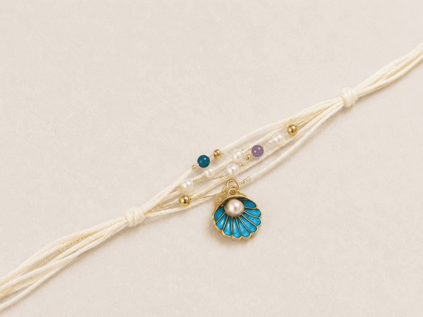 Teal Shell Pearl Charm Rakhi
